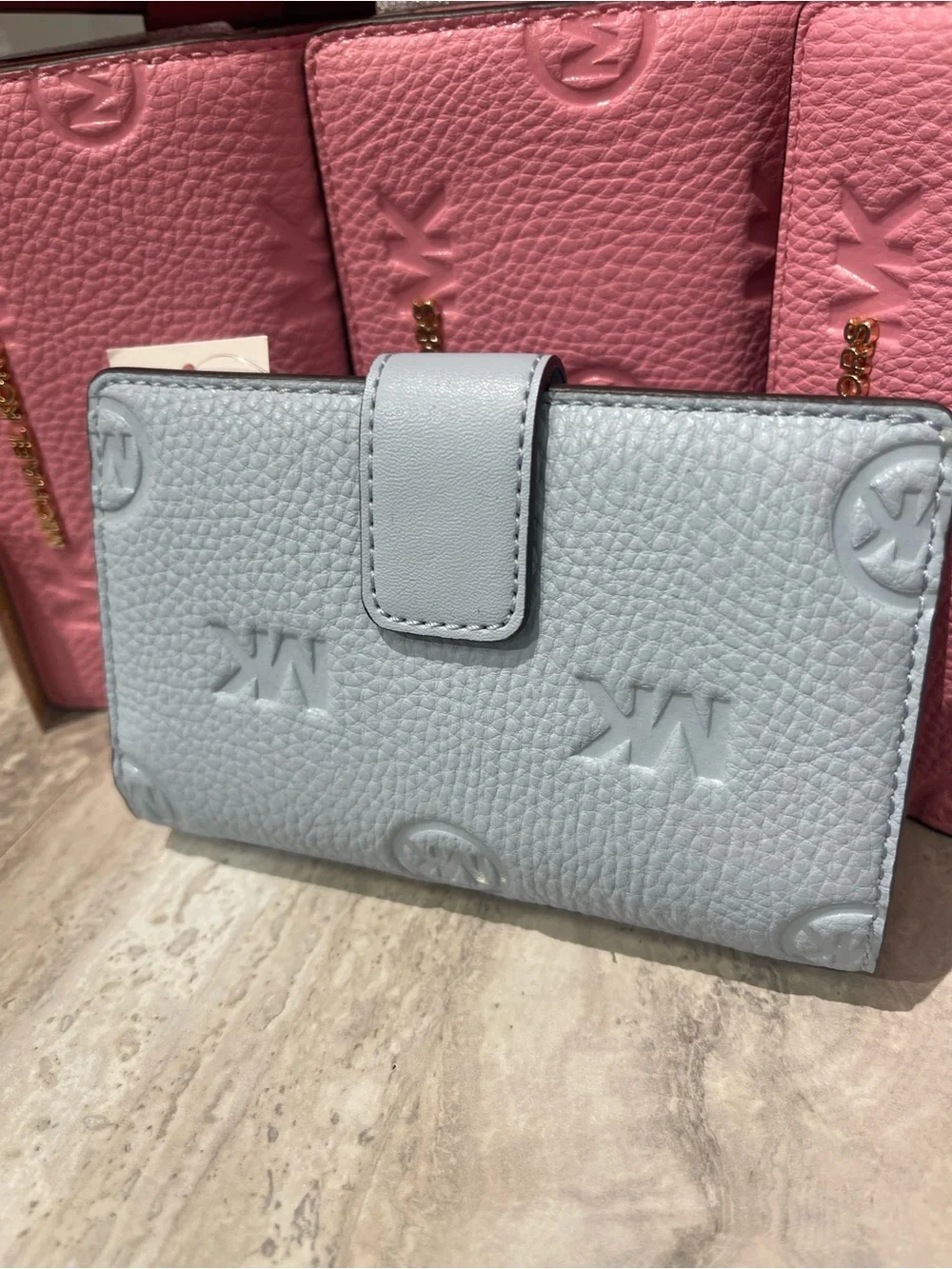 Michael Kors Embossed Logo Trifold Wallet - Light Blue